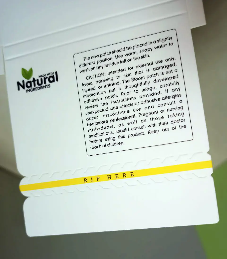 Cardboard packaging with a tear strip, matte lamination and shaped die-cutting